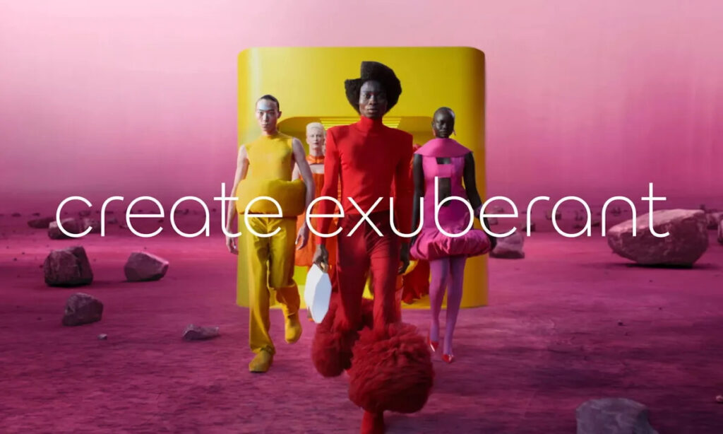 Modelos de diferentes etnias vestindo roupas vibrantes, em um cenário exuberante repleto de cores.